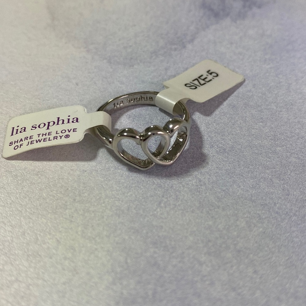 Lia Sophia two heart ring. Sizes 5
